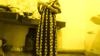 Busty MILF Desi Bhabi Has No Idea Her young Devar see Secretly in the kitchen room.