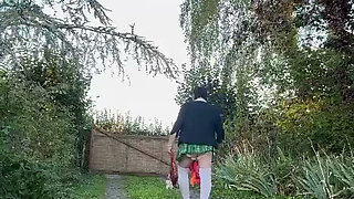 Dressed in a little plaid pleated skirt for a night out