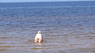 Nimble Mature Stepmommy Has Fun with Young Guys on the Beach 2