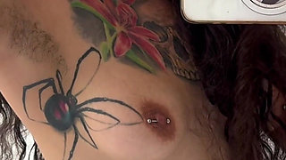 Tattooed Girl with a Split Tongue Smells Her Hairy Armpits After Working Out