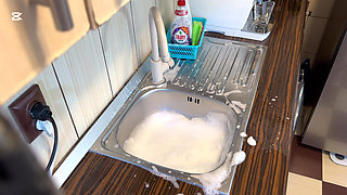 Hair Wash with Dishwasher Liquid in Kitchen Sink