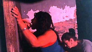 Two Hookers Take Turns Sucking Cock at Gloryhole
