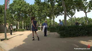 Spanish hottie gets throat fucked on the street bound in front of a busy cafe!