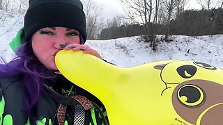 Outdoor solo masturbation scene with curly blonde
