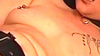 Tattooed Dom Fists Mature Blonde in Chains