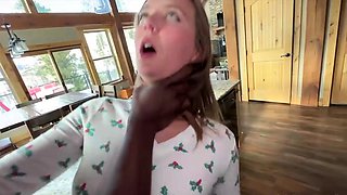 Petite young housewife rammed by black bull in the kitchen
