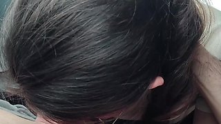 Brunette girl blew her boyfriend in the car and both enjoyed it POV