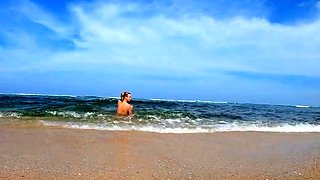 Blonde Babe's Naked Swim in the Ocean