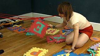 Beautiful redhead shoves toy up her ass