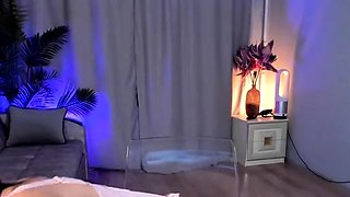 Small titted brunette Sharron with glasses masturbates