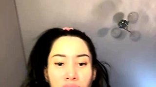 Brunette with foot fetish rubs big dick with her feet in POV
