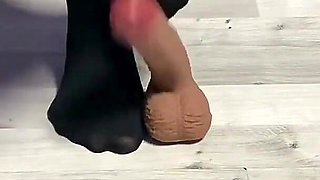 Sexy Dominatrix in Nylon Pantyhose Is Trampling Your Cock