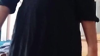 Indian Homo Crossdresser Gaurisissy demonstrating and pressing her large bra-stuffers in black sundress