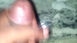 Playing with his huge dick
