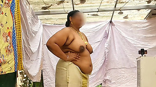 Traditional kerala style dressed Bhabi showing her huge sexy boobs, walking topless