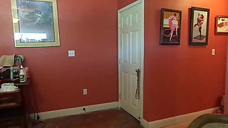 Crossdresser helps put on a corset for BBW