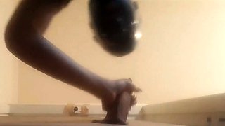 High-Heeled Milf Sucks and Fucks in a Catsuit at a Gloryhole