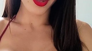 Bodacious brunette beauty plays with her fabulous big tits