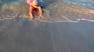 Try Not to Wet My Hair While Play with the Waves