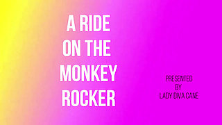 Male Slave Riding The Monkey Rocker in the Leather Arn Binder while Mistress Fills the Urinal Gag