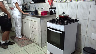 Maid had her ass used while washing dishes.