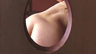 Mature MILF Sucks Hard Cock Through Glory Hole