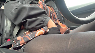 Elegant stepmom drives to the office wearing tights and a beautiful dress