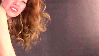 Redhead slut with big boobs goes down