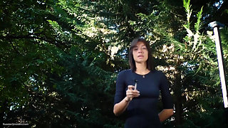 Sweet Russian Beauty Smoking Cigarette in Nature