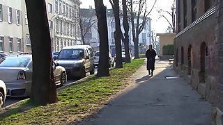 Blonde bitch pissing on the city street