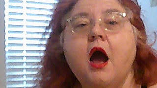 Mature BBW Redhead Nurse Vicki Talks to You as She Makes a Lipstick Applying Video for You!