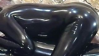Rubber Slave Is Used Sexually