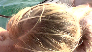 Blonde teen sucks avidly a hard cock