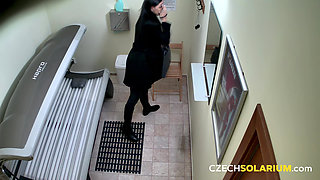 Czech Solarium 144: Brunette Can't Get Enough of a Solarium Striptease