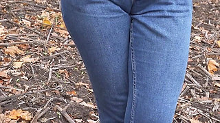 MILF Teasing Her Big Cameltoe in Blue Jeans Outdoors