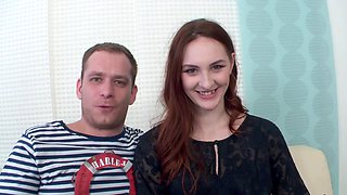 Redheaded Irina flaunts her lacy lingerie in a steamy doggy style scene with husband