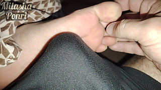 Stepsister's feet get a light massage while watching a movie
