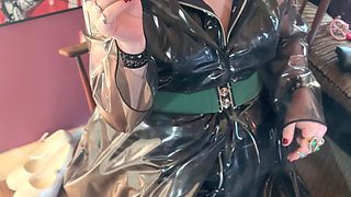 PVC Clad In Her See Through Coat Miss Tina Snua Smokes A Cigarette For You