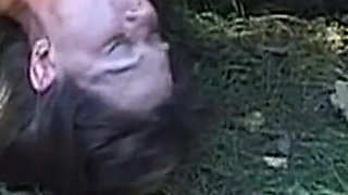 Corseted Brunette MILF Enjoys Masked Oral Devotion Outdoors
