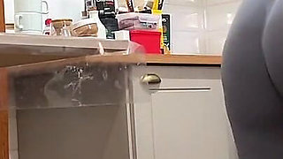 Sexy Brazilian Woman Tidying up the House with Leggings