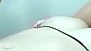 Blonde MILF Shivers Under Electro Stimulation on Table