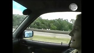 Cute blonde teen masturbating with fingers in car backseat