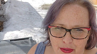 Calm Outdoor Smoking Moment with a Playful Lipstick Look