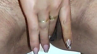 A Hot Brunette Pees in the Toilet