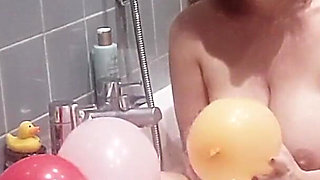 Taking a Bath and Playing with Balloons