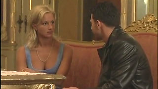 Blonde bitch gives a juicy blowjob to a boy in a couch