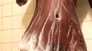 Sexy amateur chick taking a shower and masturbating