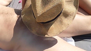 deepthroat on a nudist beach