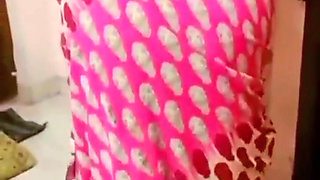 A cuckold husband admires the beauty of his sexy Desi wife after asking her to wear a saree.