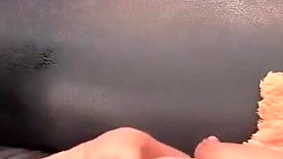 He Puts the Dildo in Her While Sucking Her Tits
